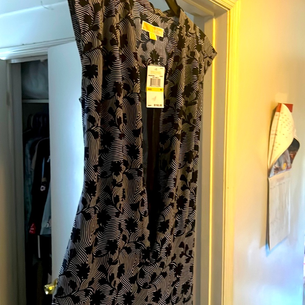 Brand new black and white Michael Kors jumpsuit.